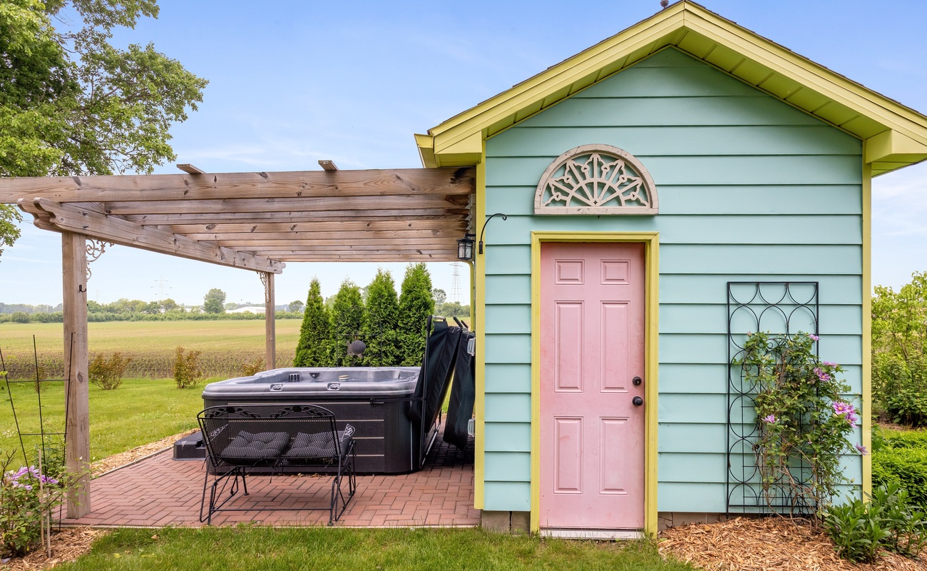 Soak in style beside the cutest pastel shed in the Midwest.