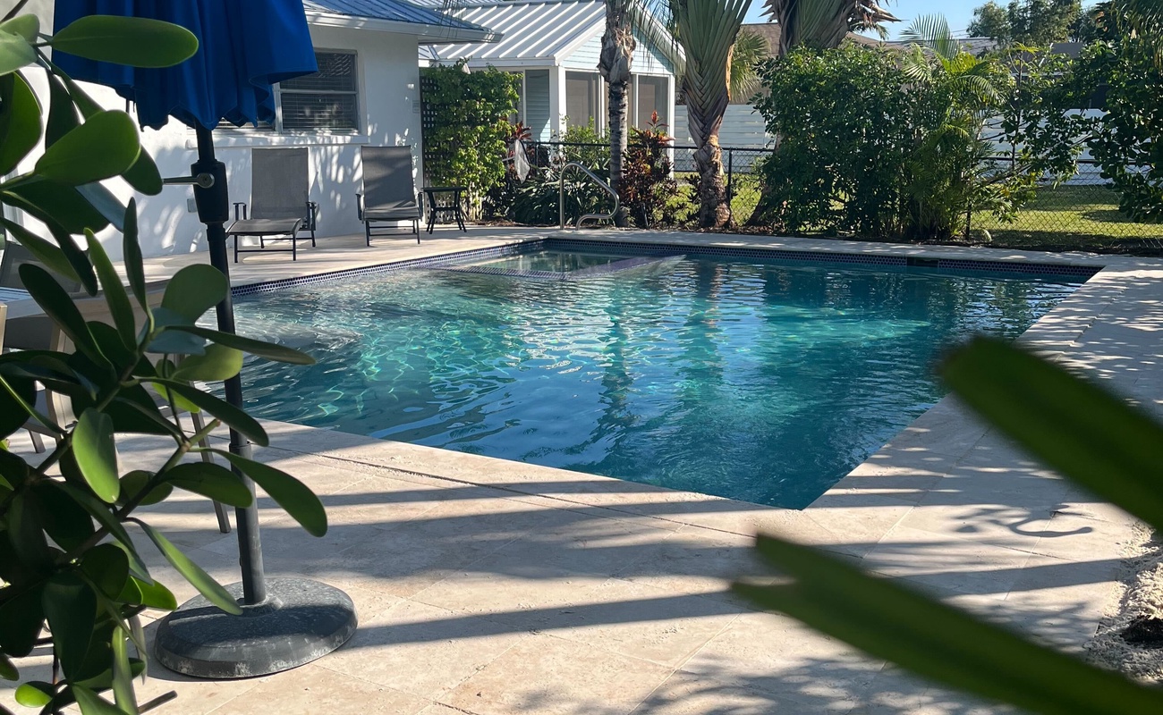 Framed by palms, made for pool days.