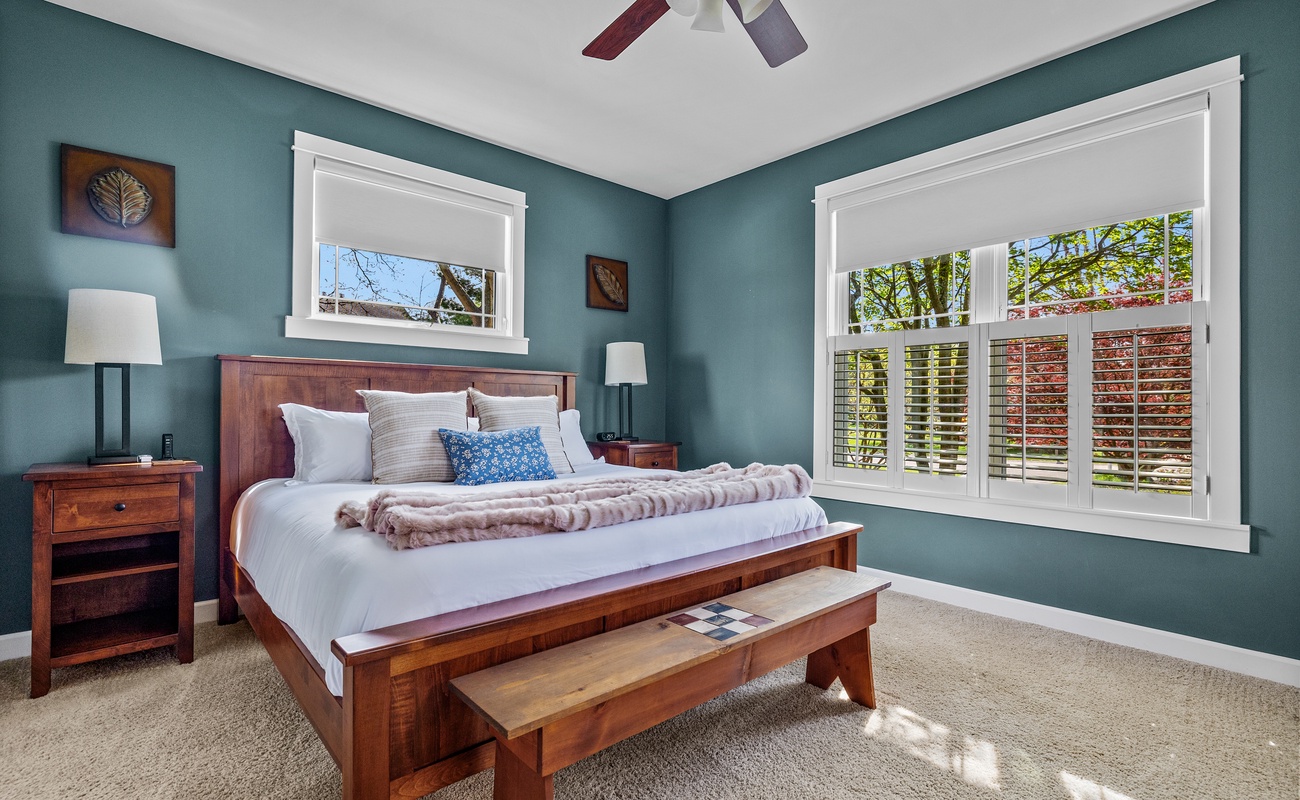 Primary bedroom is on the main level & has a king-size bed.