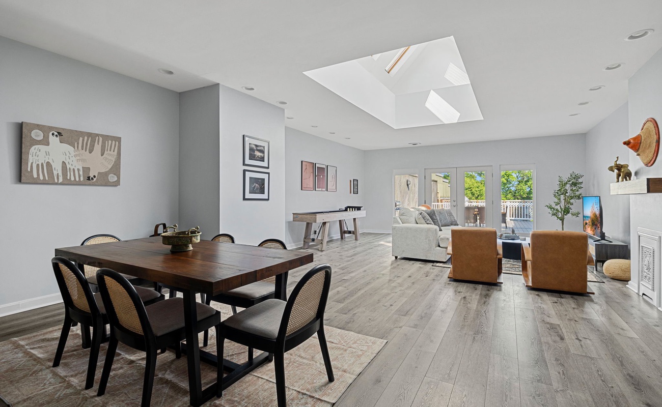 Dining, lounging, and playing—this open-concept space has it all! Perfect for entertaining or just kicking back and relaxing.