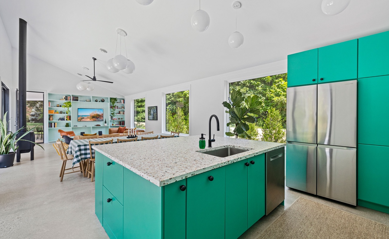 An open kitchen design allows for seamless conversation and connection.