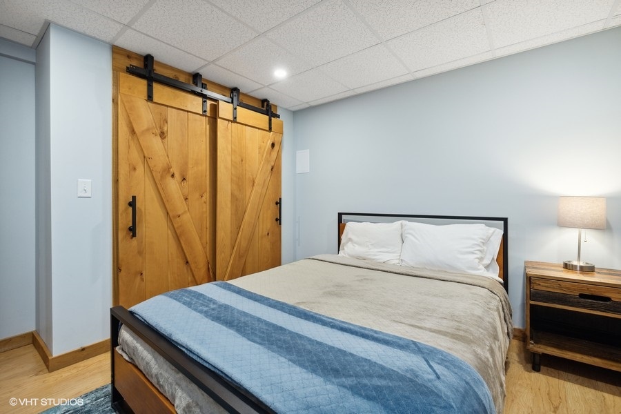 Bedroom 5 is on the lower level & has a queen-size bed.