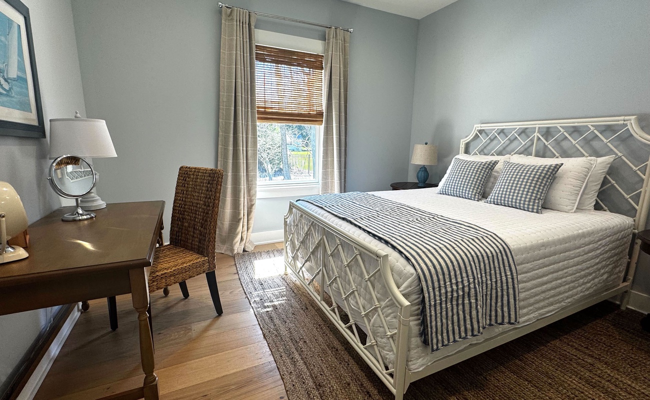 Bedroom 3 is on the main level & has a queen-size bed.