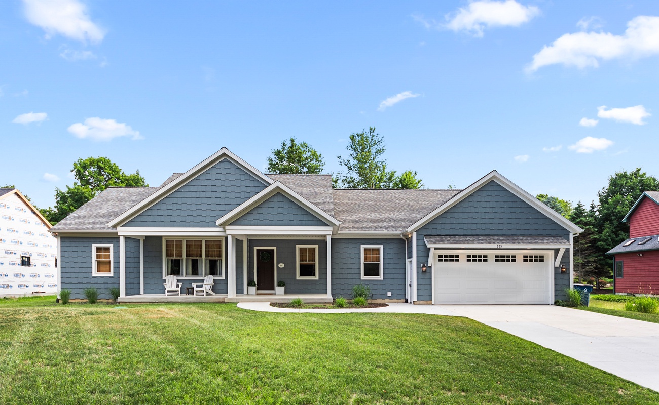 Bright blue skies and a picture-perfect porch - welcome to Blue Hill Cottage!
