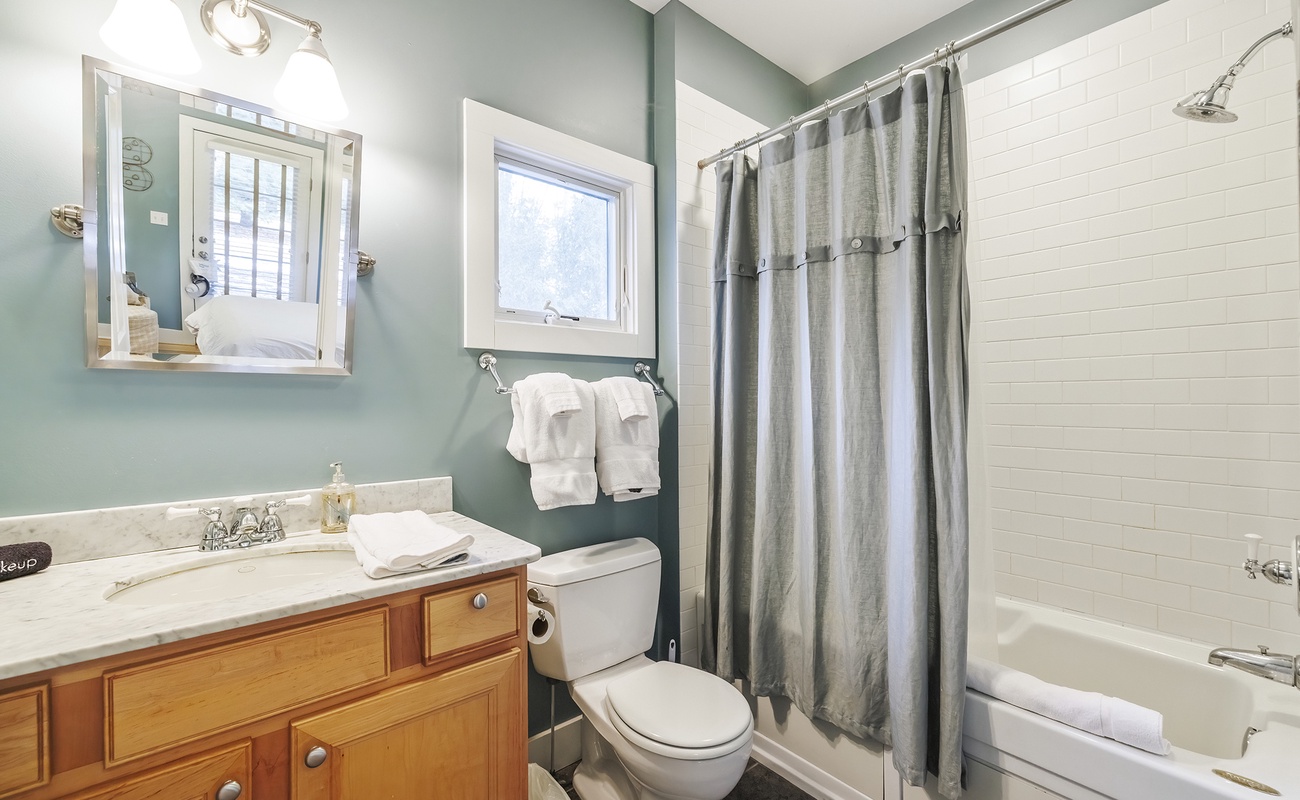 Bathroom #2 is on the main level, shared for guests and bedroom #2.