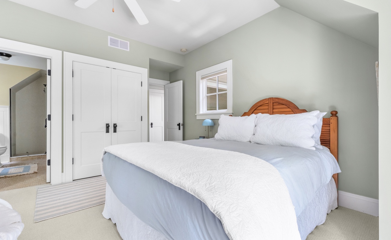 Bedroom 4 is on the upper level & has a queen sized bed.