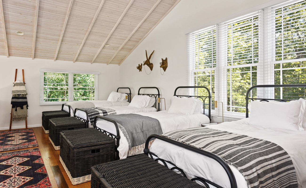 Bedroom 3 is on the upper level & has 4 twin-size beds.