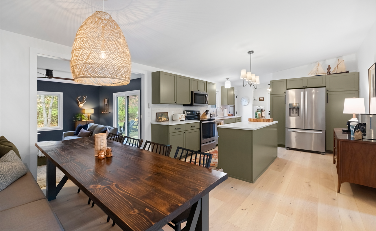 The kitchen opens to both lounges, keeping everything within easy reach.