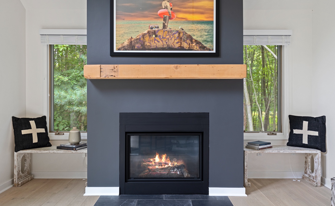 Relax by our stunning wood-burning fireplace.