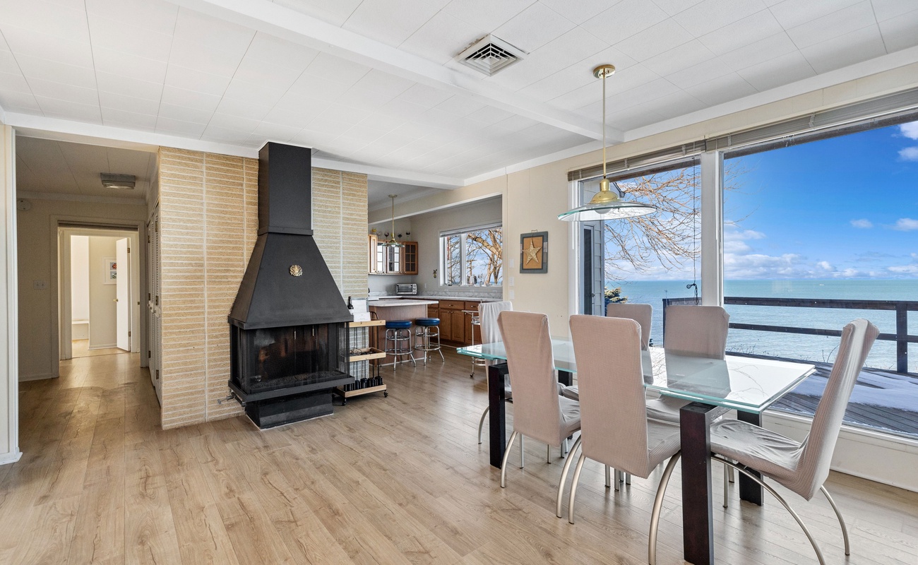 The spacious dining area offers plenty of room for everyone to gather around at mealtime.