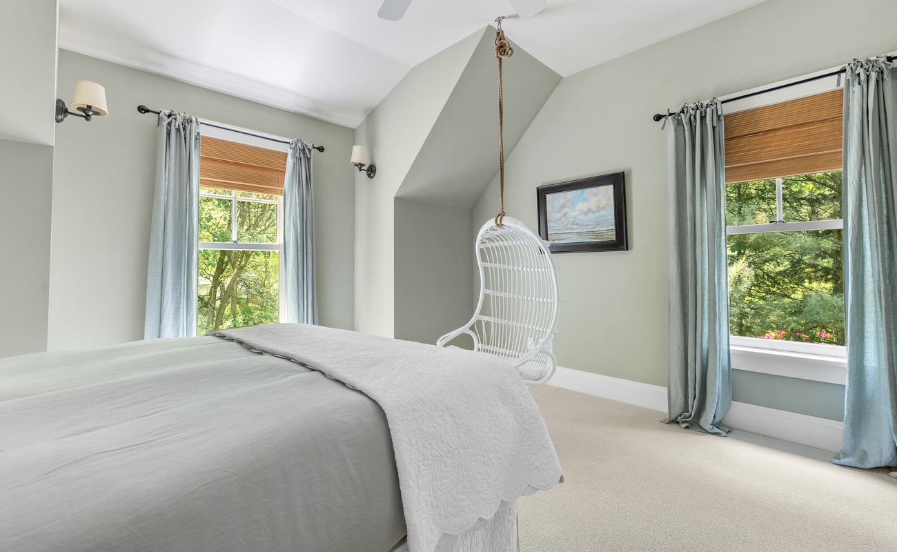 Lounge in luxury under the skylight swing.