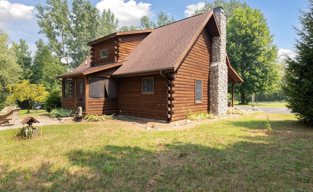 County Line is a classic log cabin set on 10 peaceful acres.