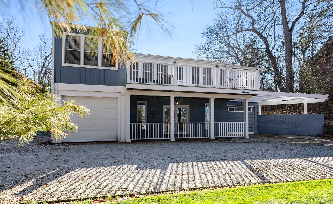Welcome to Barefoot Cottage—your Grand Beach retreat steps to the lake.