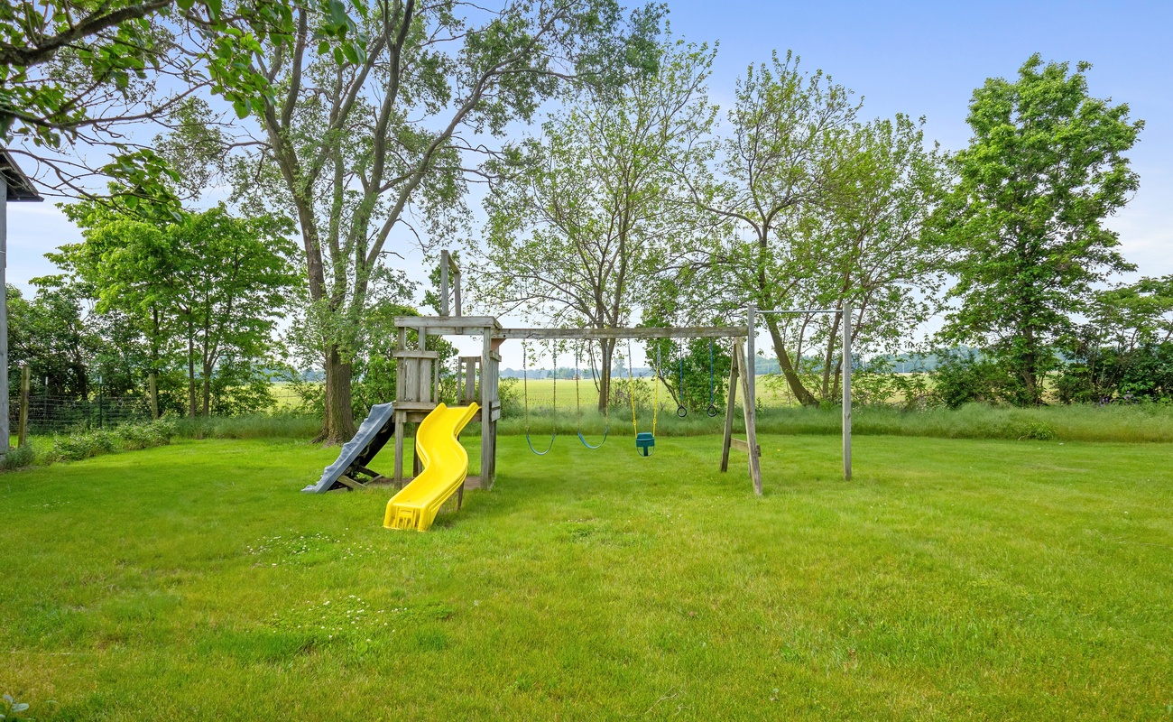 A kid-friendly paradise with swings, slides, and space to roam.