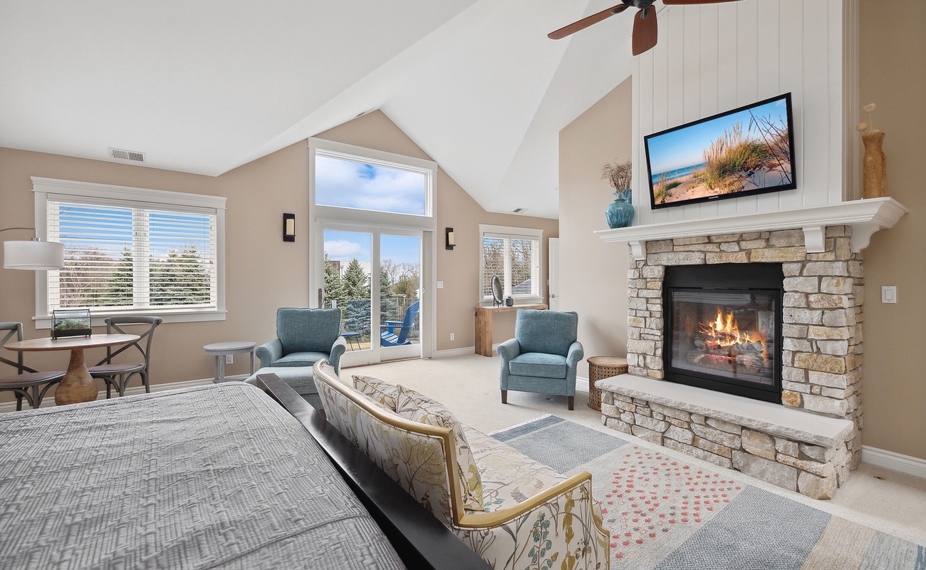 With a cozy fireplace and balcony, this space is the perfect escape from the stresses of daily life.