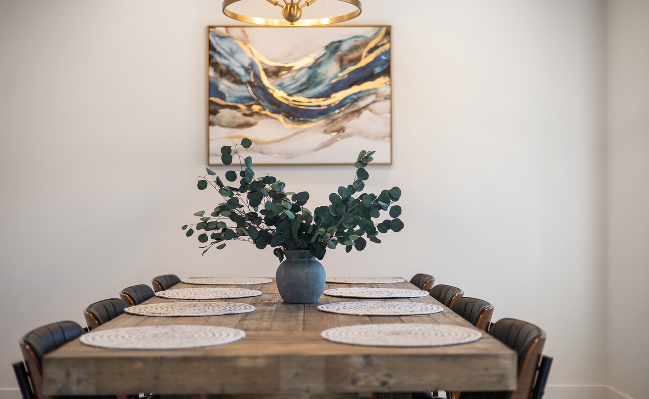 A warm table setting inviting slow dinners and shared conversation.