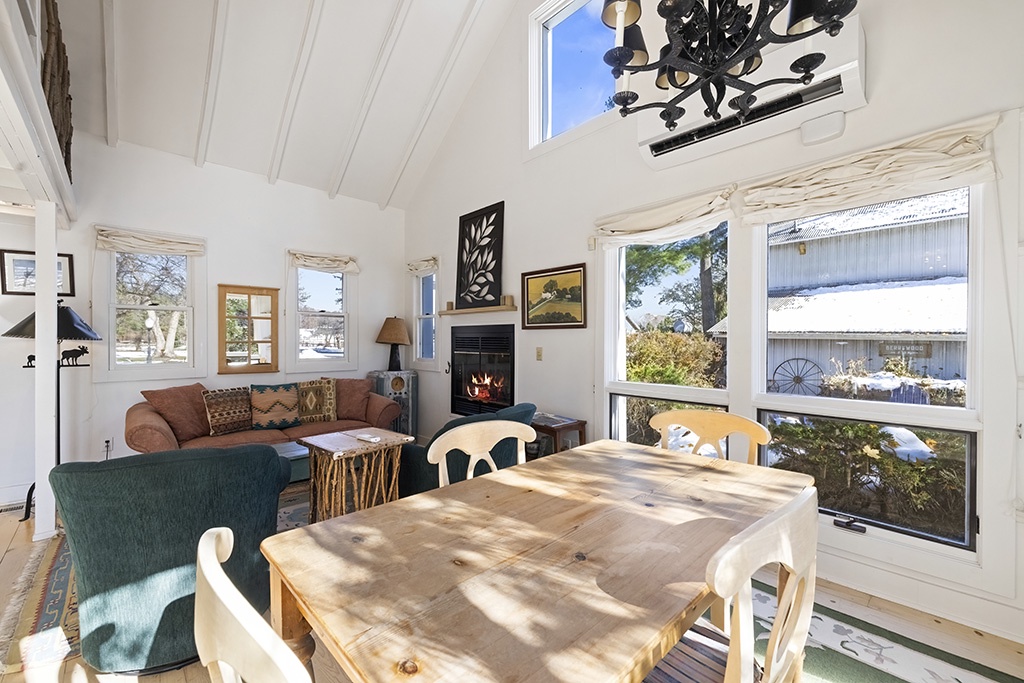 Meals and fireside chats flow together in The Cottage’s open, sunny layout.