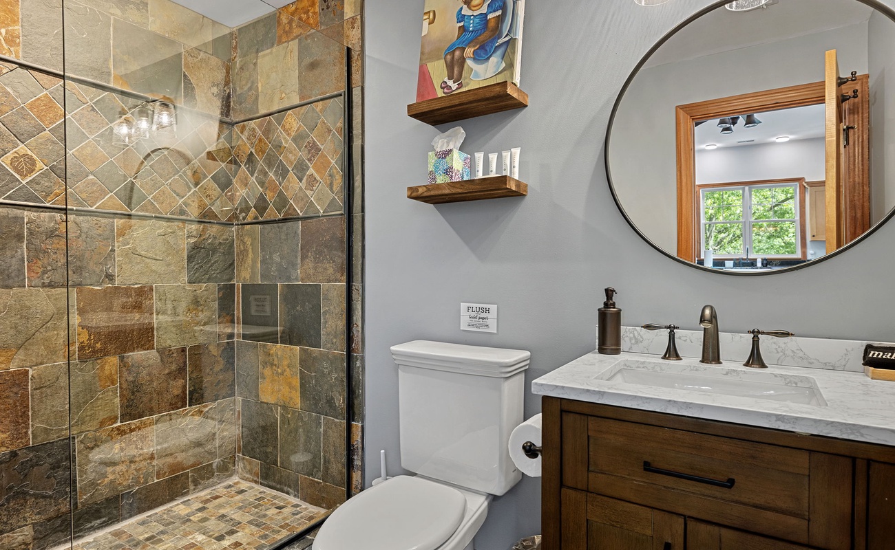 Complete luxury is all yours in the walk-in shower with double-rain heads.