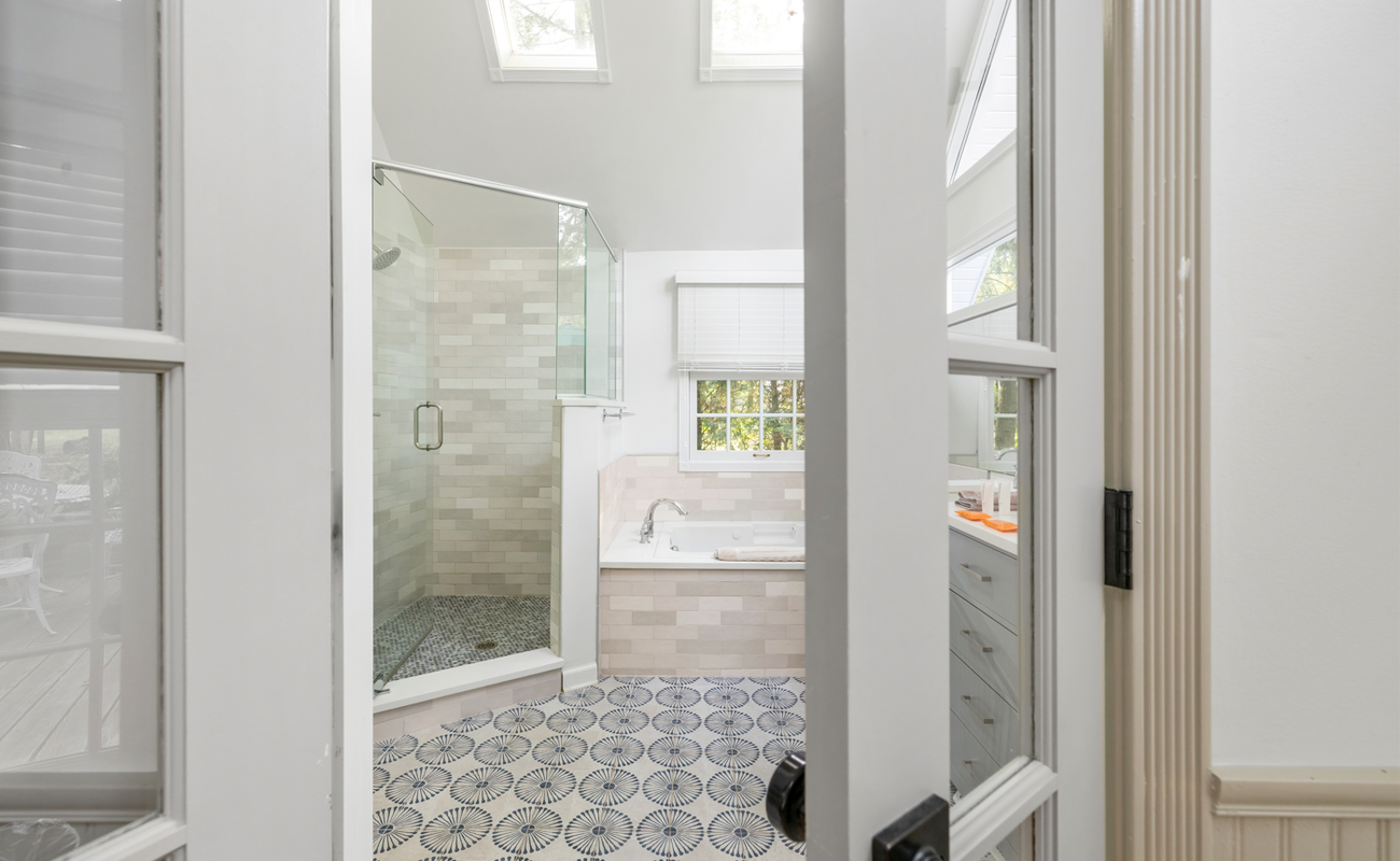 Spa-inspired bathroom with walk-in shower and soaking tub.