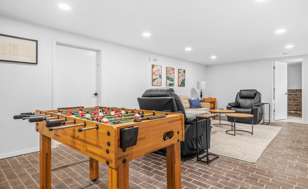 Game on! Kick back with foosball, recliners, and good vibes all around!