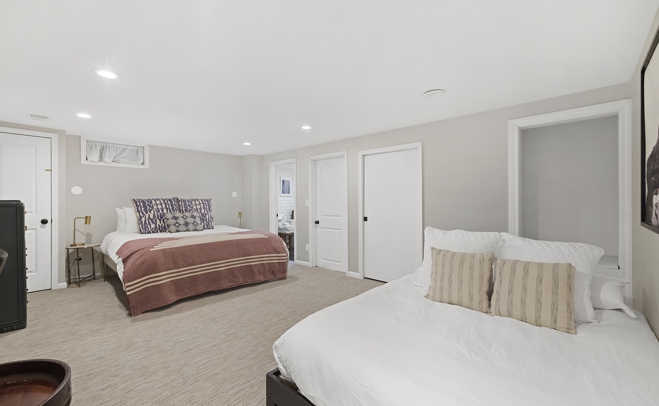 Bedroom 4 is on the main level and has a king and a queen-size bed.