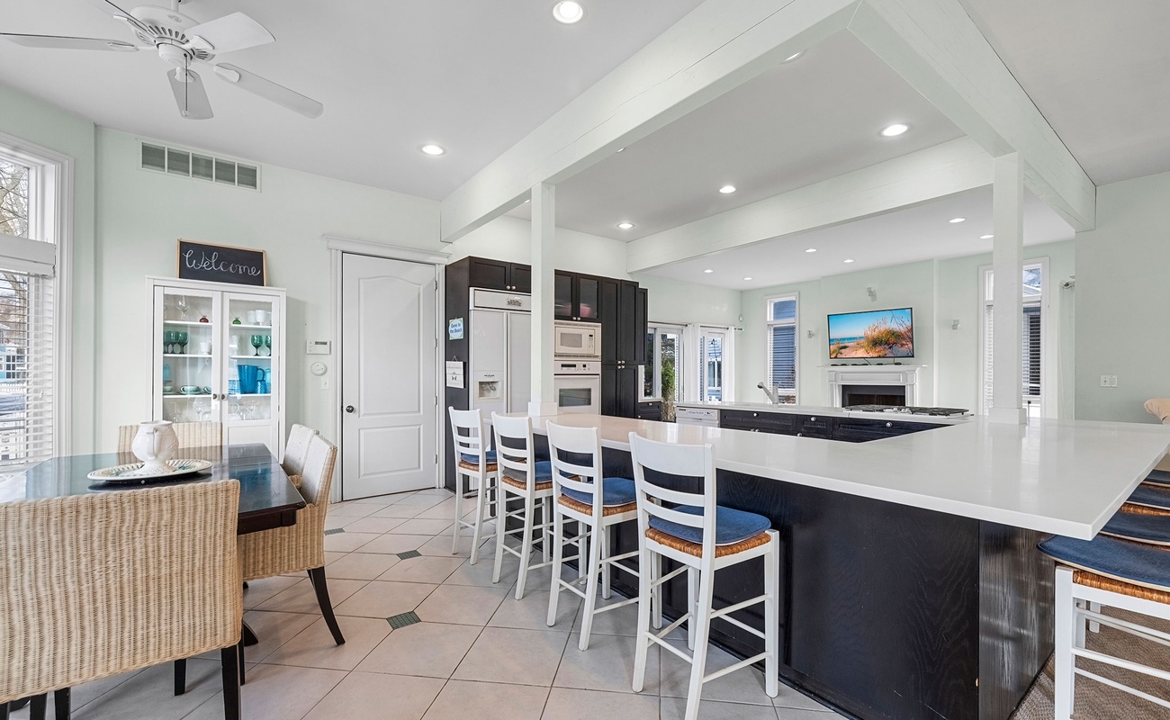 Cook together while everyone stays connected across the open living space.