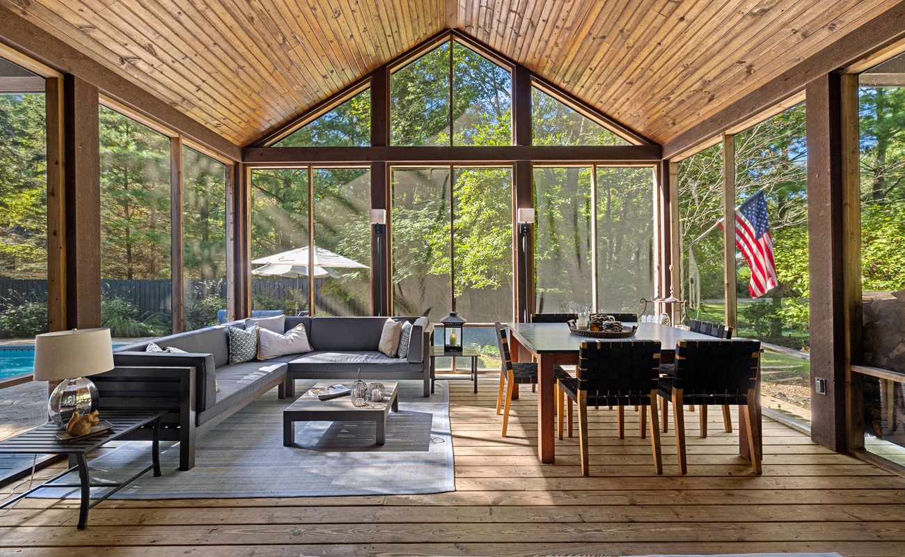 Soak in the outdoors with our floor to ceiling windows enclosed patio.