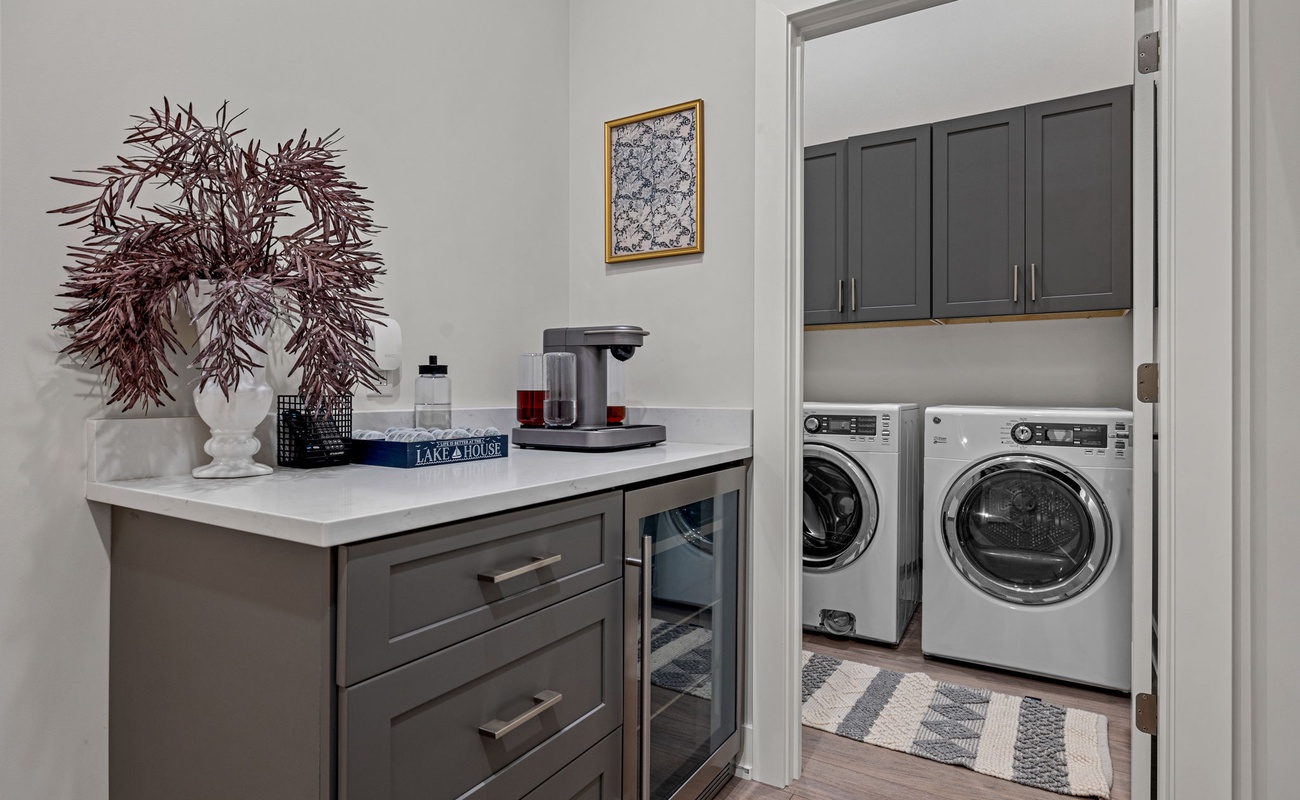 A laundry room so chic that even folding clothes feels fancy.