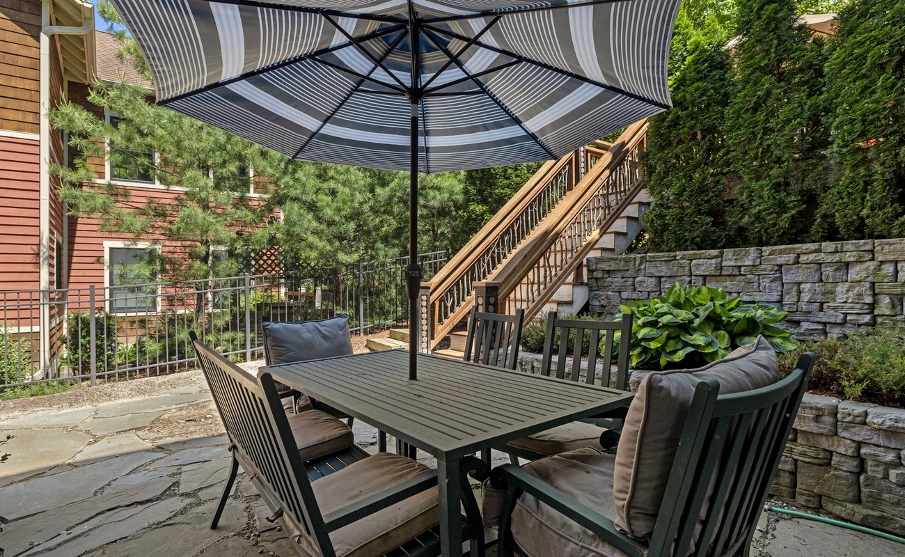 Escape for a quiet meal on the lower patio.
