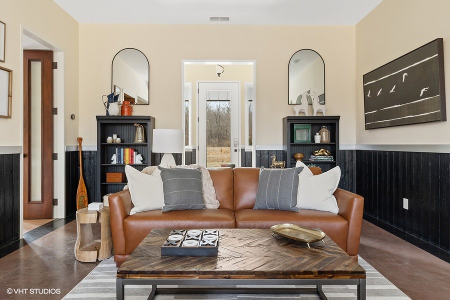 The interior is brimming with elegant, yet comfortable furnishings throughout.