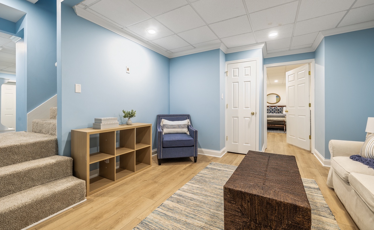 Need a break from the action upstairs? This cozy nook is your go-to for calm and comfort.