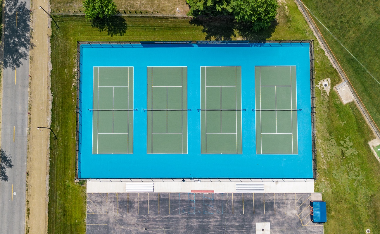Hit the courts—just 4 minutes from Hearth & Timber.