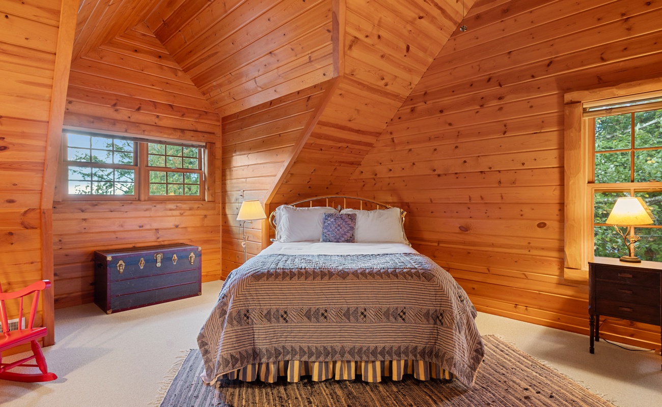 Bedroom 2 is on the upper level and has a queen-size bed.