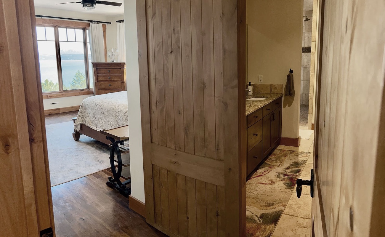 Slide into relaxation—barn doors never looked so chic.