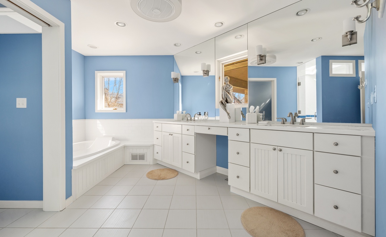 Beautifully appointed with a soaker tub and deluxe vanity - Ooh-la-la!