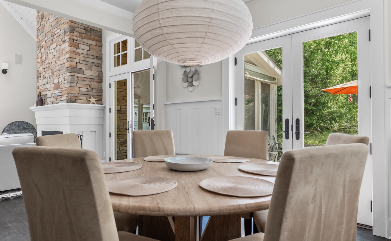 Luxury dining with a view - indoor elegance, outdoor glow.