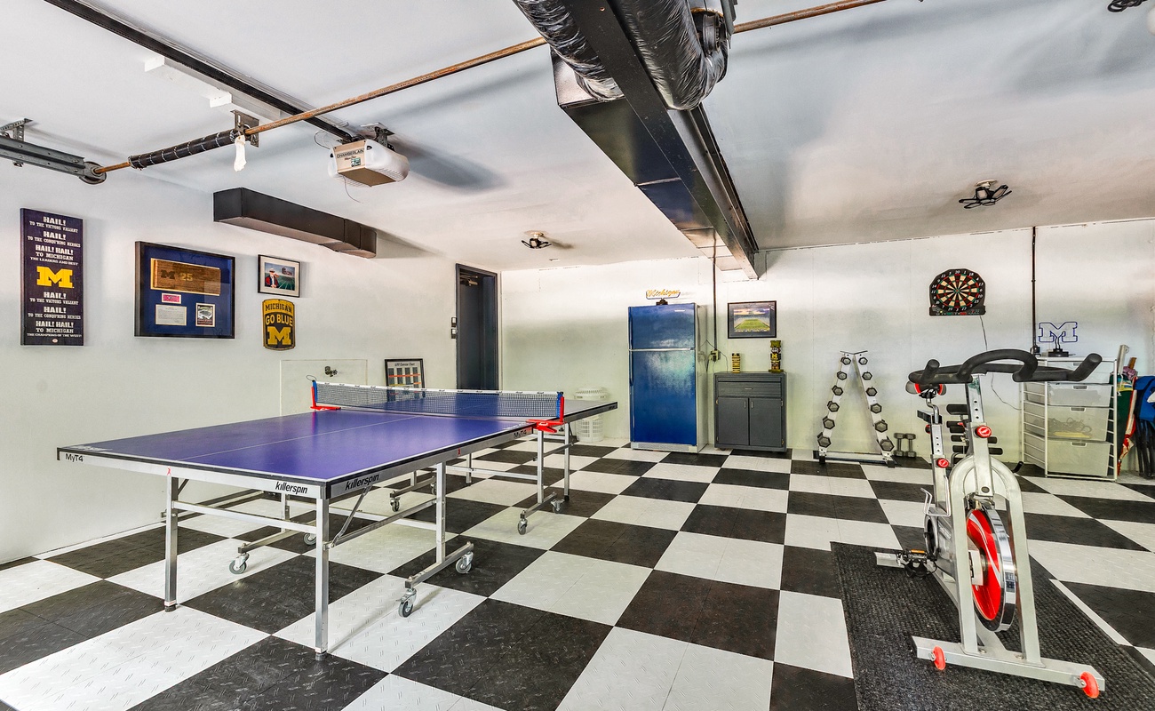 Game on! Ping pong, darts, and a mini gym right at home.
