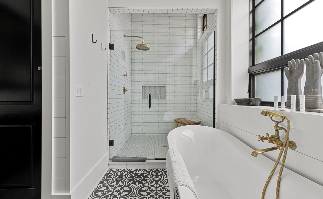 The oversized walk-in shower provides a luxury spa experience every day of your stay here.