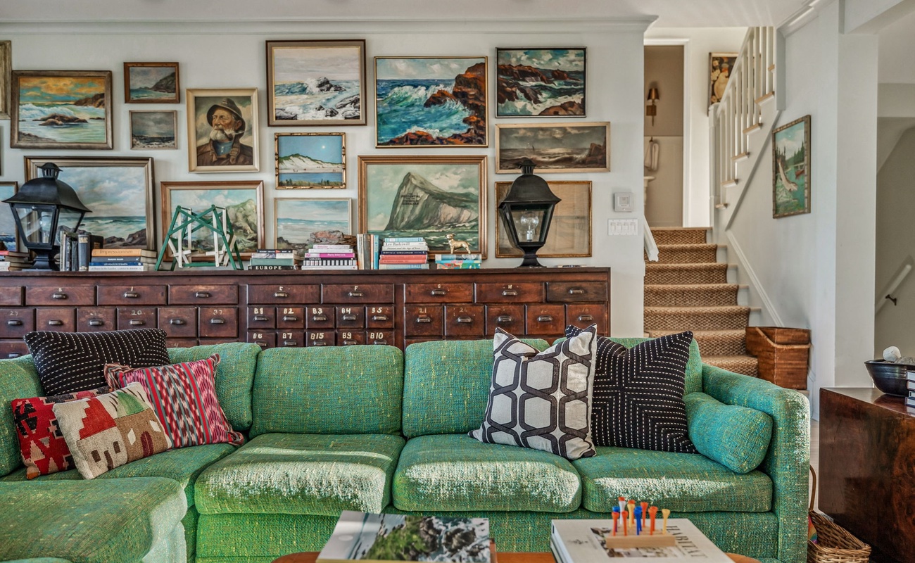 This is what happens when your living room is also a mini museum—comfort meets creativity.