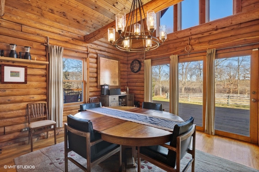 Gather around the dining table in the heart of this inviting and cozy home.