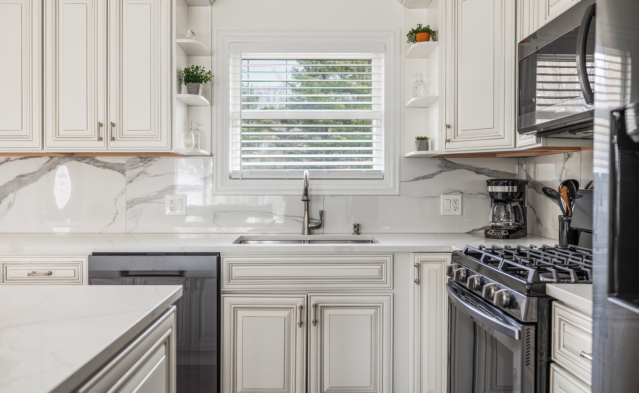 Backsplash: fancy. Herbs: thriving. Oven: basically a culinary stage.