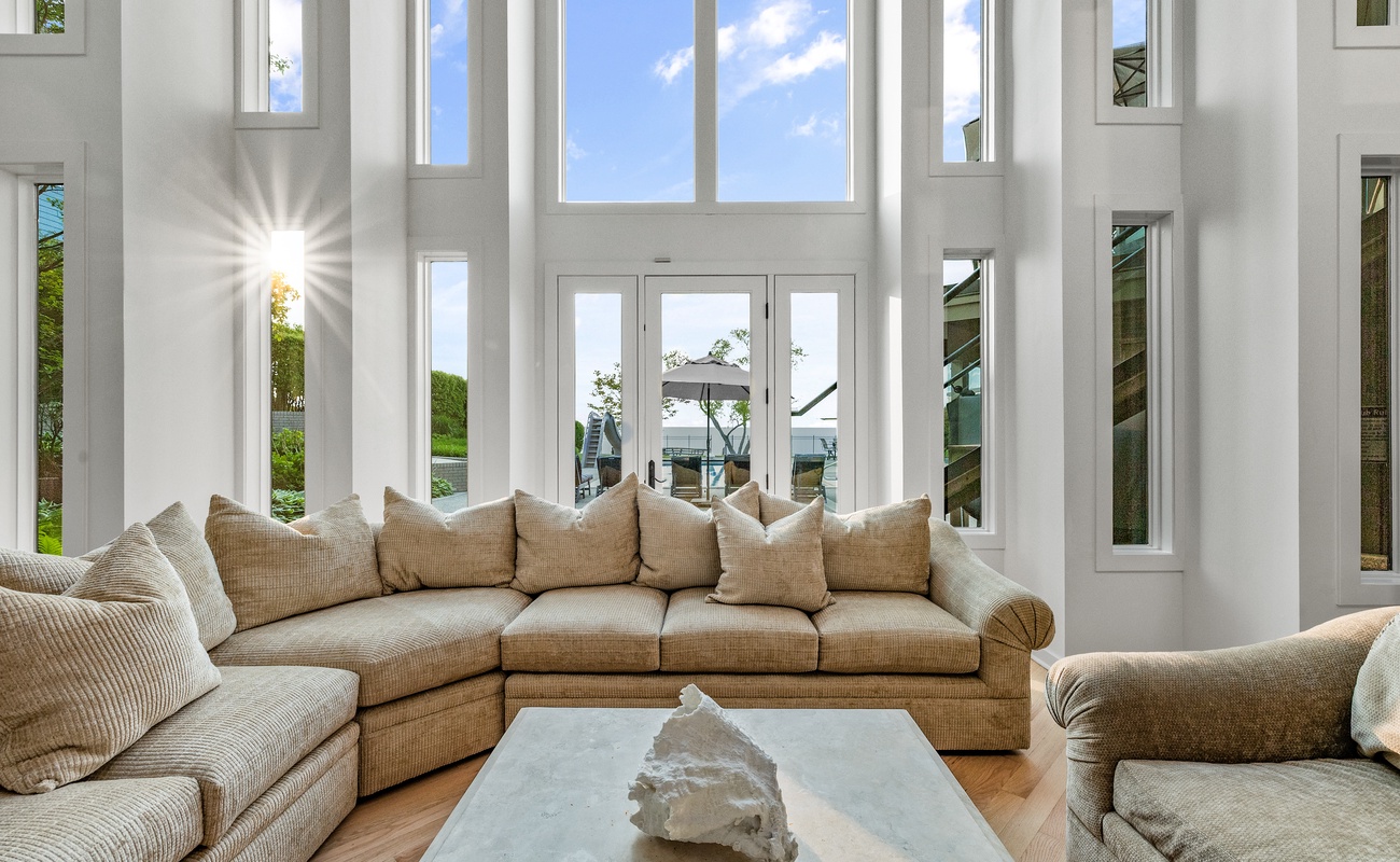 A stunning wall of windows makes for amazing natural light and easy chillin'.