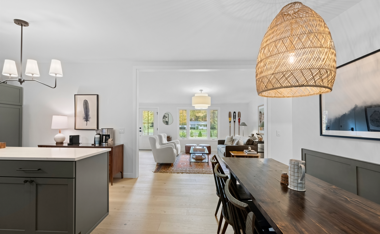 Open dining flows into the lounge, made for shared meals and moments.