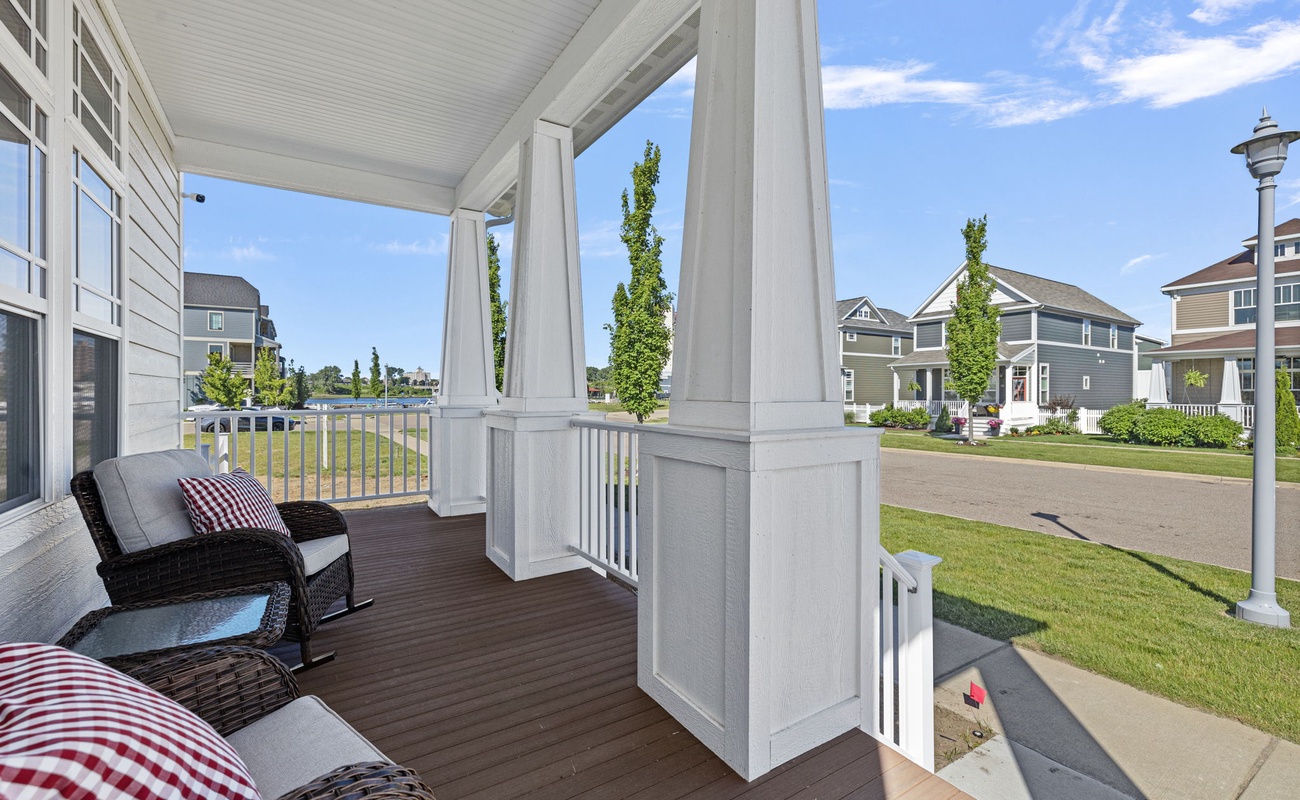 Comfy rattan rocking chairs on a covered porch? Two words - Relaxation Station.