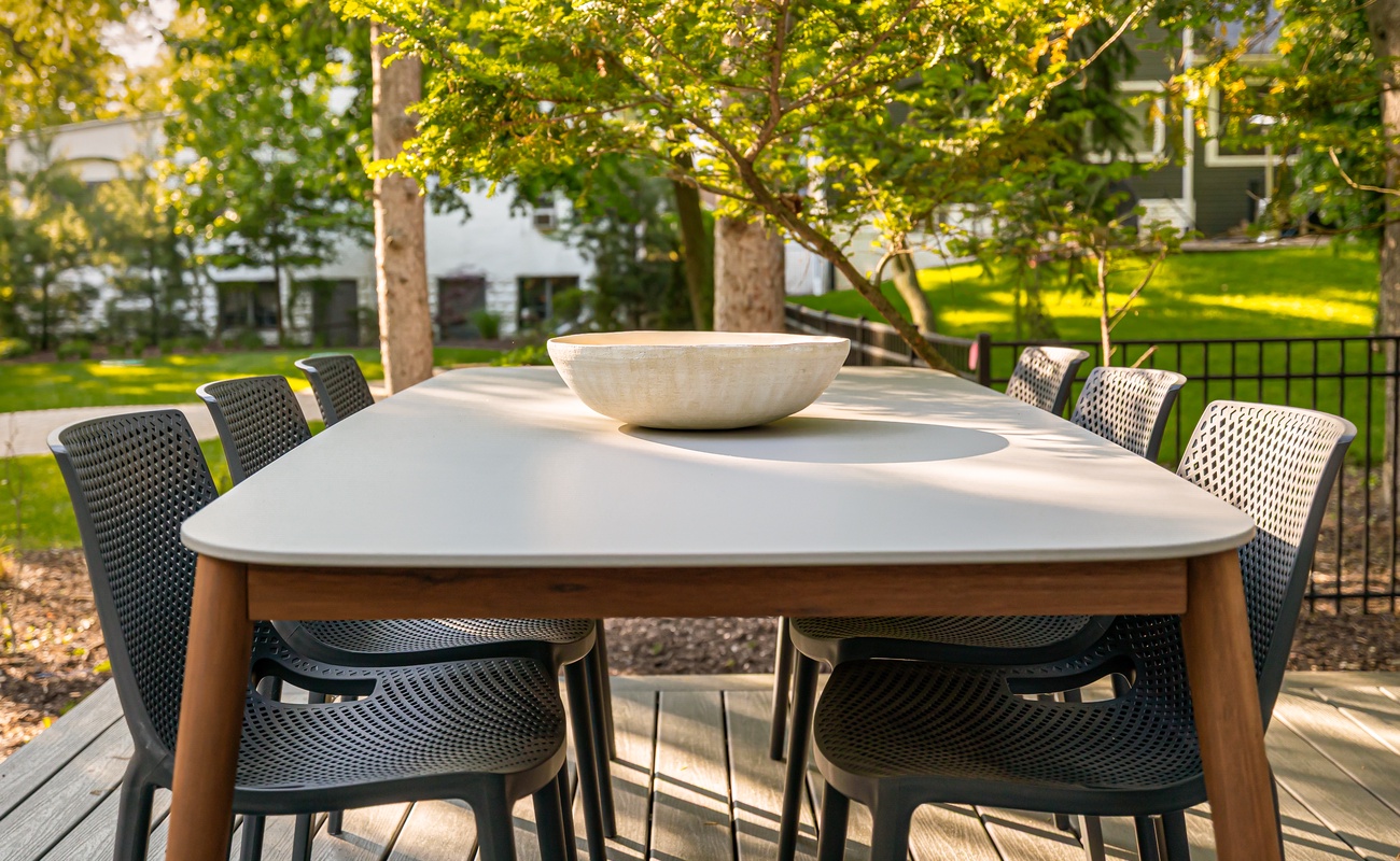 Deck dinners hit different in the dappled light.