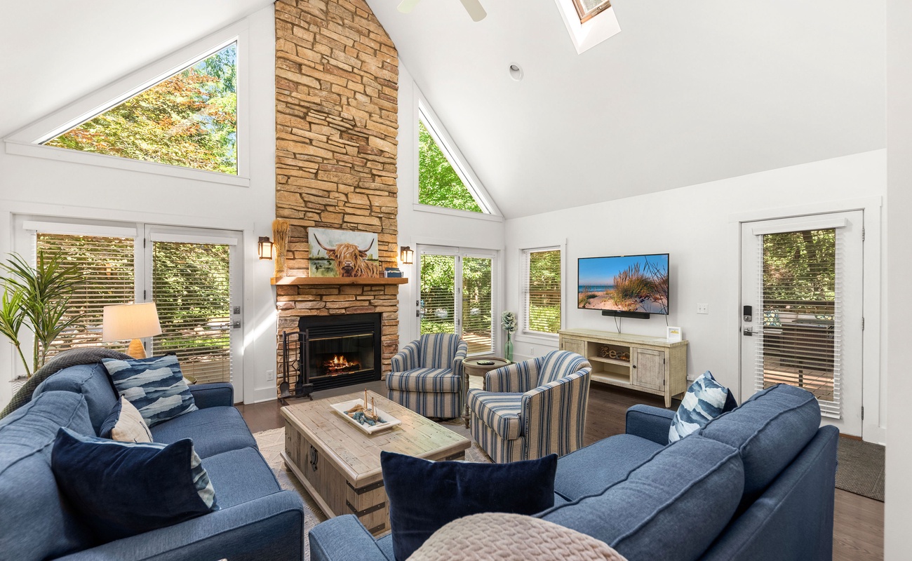 Vaulted ceilings, plush seating, and that perfect fireplace glow.