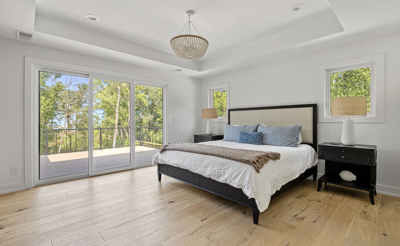 Primary bedroom is on the main level & has a king-size bed.