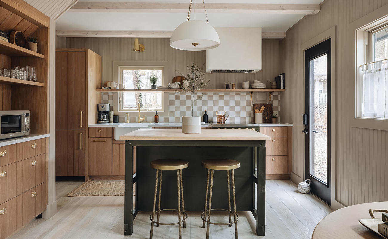 The Fern's fab kitchen island is a frequent gathering spot for morning coffee.