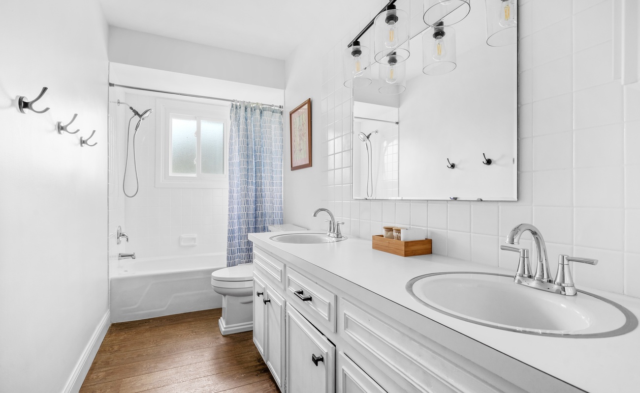 Bright, fresh, and spa-like. This double-sink dream bathroom is made for relaxing getaways!