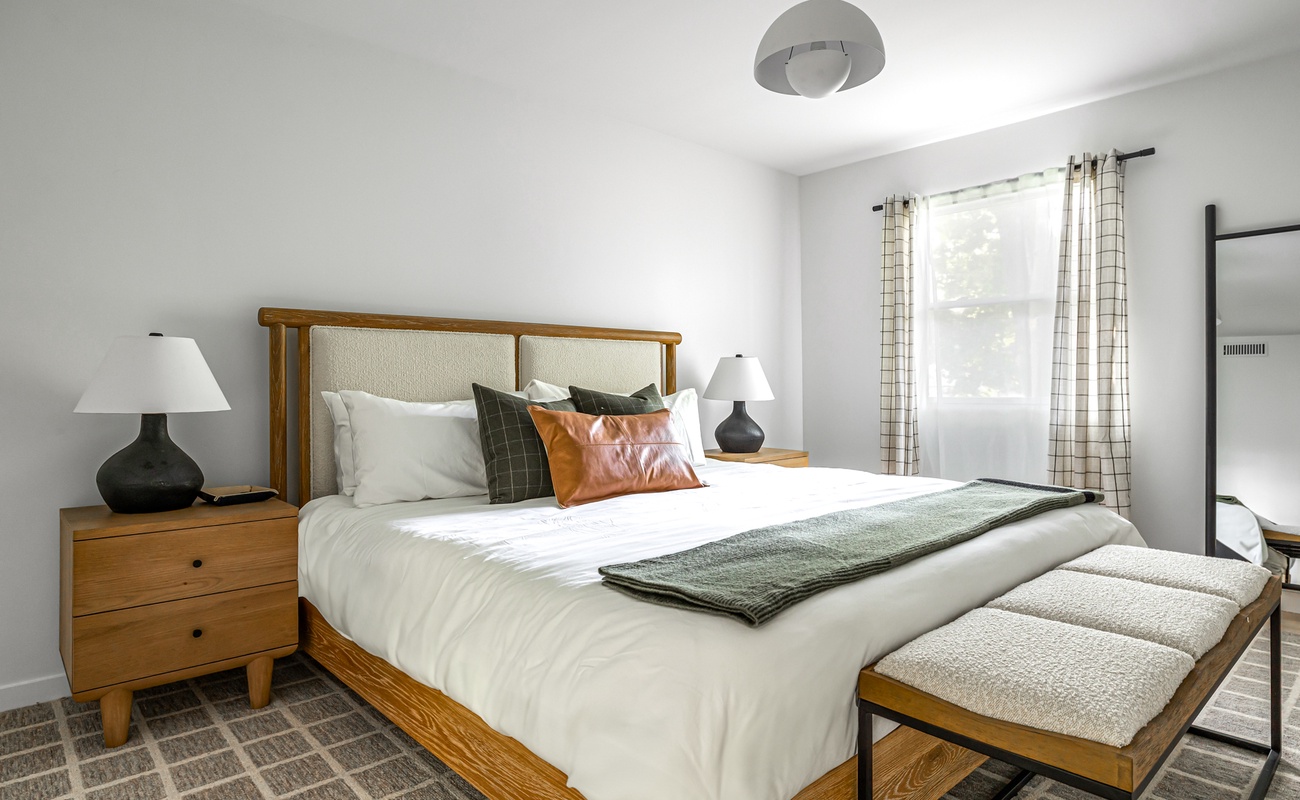 Primary bedroom is on the main level & has a king-size bed.